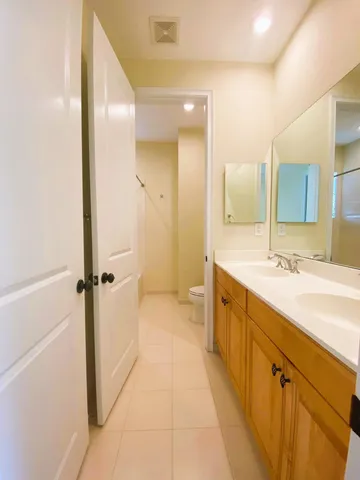 a spacious bathroom with a shower and a tub