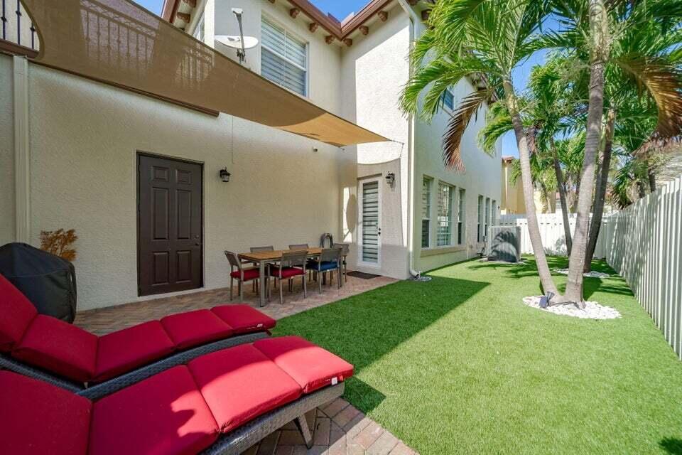 50 Via Poinciana Lane Boca Raton, FL 33487 - Photo 49 of 51 a view of yard with patio