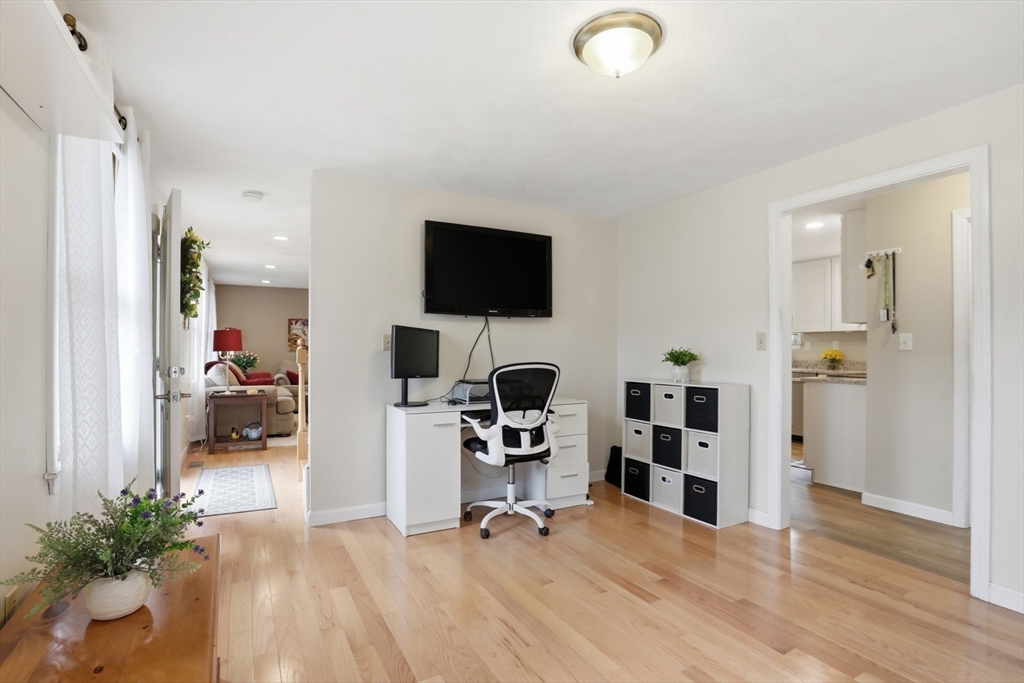 18 Trifiro Road Billerica, MA 01821 - Photo 11 of 42 a view of a livingroom with a flat screen tv