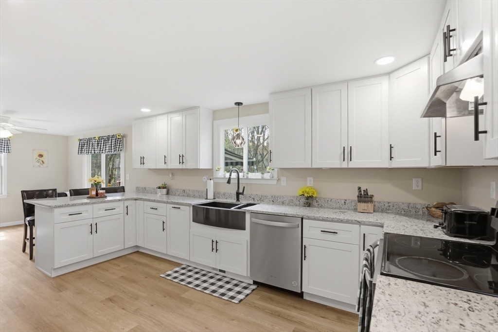 18 Trifiro Road Billerica, MA 01821 - Photo 13 of 42 a kitchen with a sink stove and cabinets