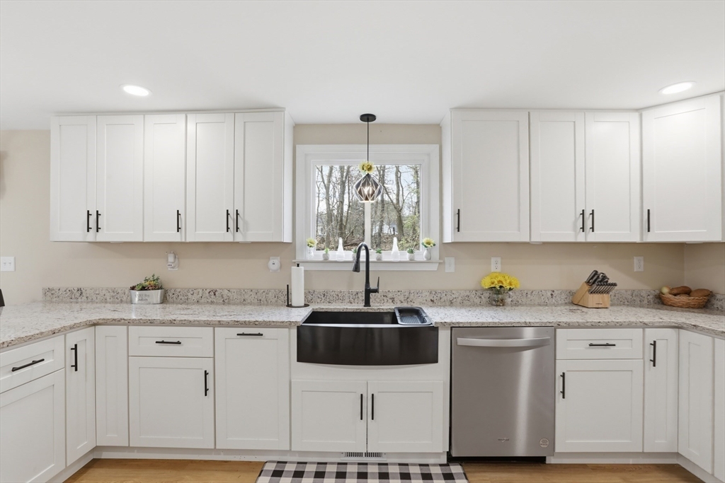 18 Trifiro Road Billerica, MA 01821 - Photo 14 of 42 a kitchen with a sink and cabinets