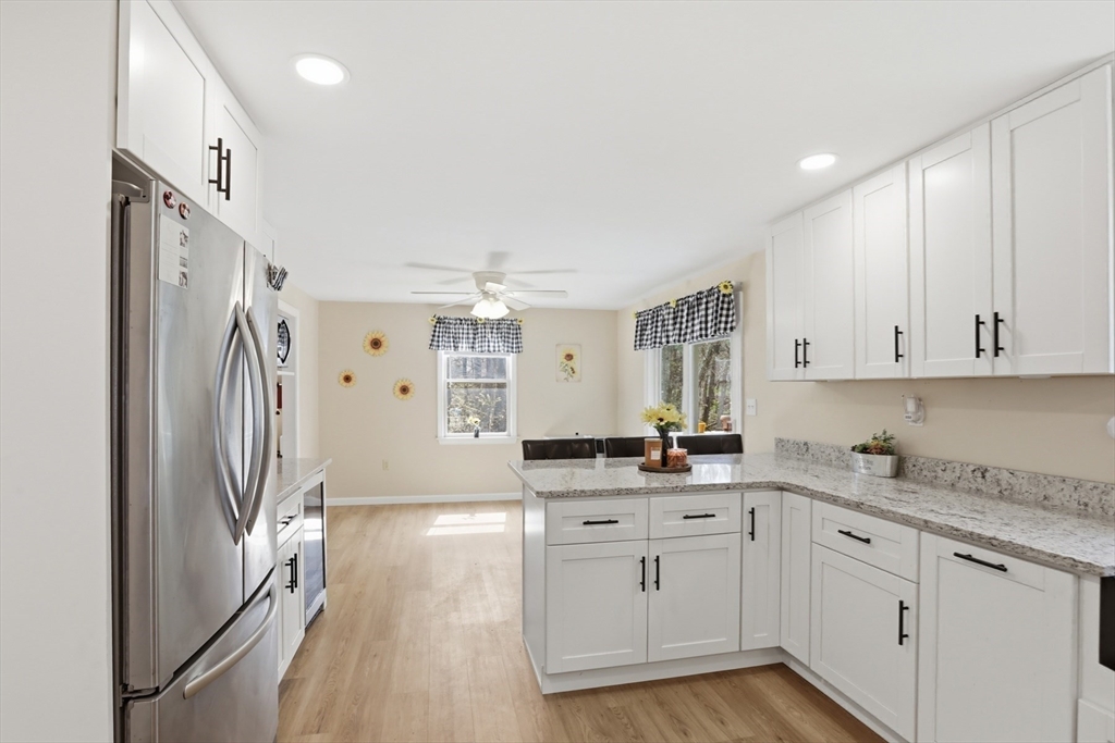18 Trifiro Road Billerica, MA 01821 - Photo 15 of 42 a kitchen with granite countertop a refrigerator sink and cabinets