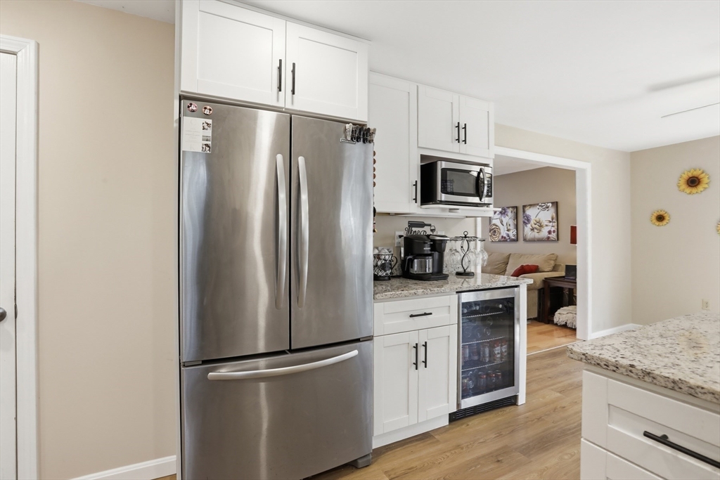 18 Trifiro Road Billerica, MA 01821 - Photo 16 of 42 a kitchen with stainless steel appliances granite countertop a refrigerator stove and sink
