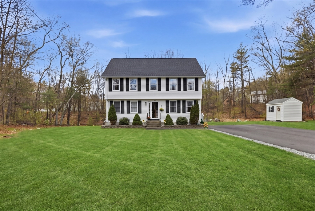 18 Trifiro Road Billerica, MA 01821 - Photo 2 of 42 a view of a house with a yard