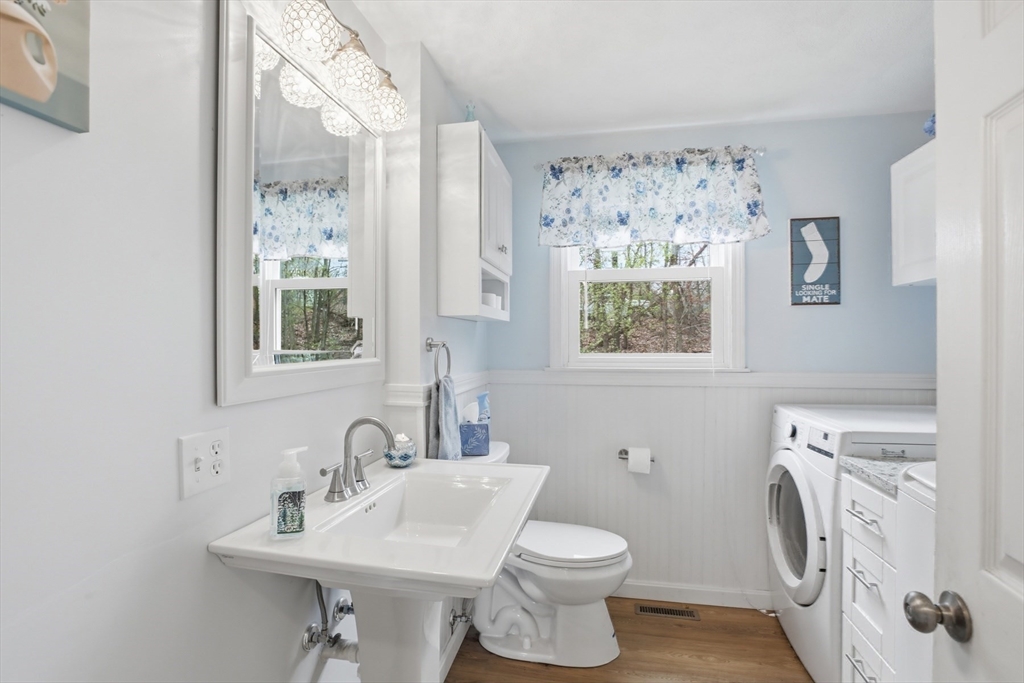 18 Trifiro Road Billerica, MA 01821 - Photo 23 of 42 a bathroom with a sink toilet and a mirror