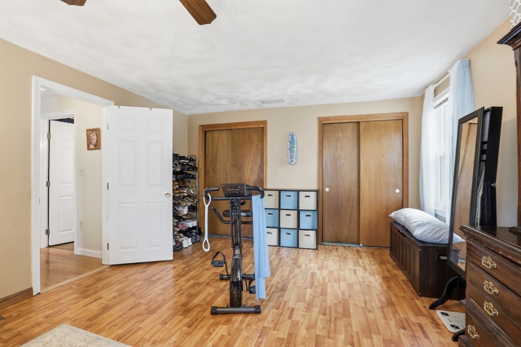 18 Trifiro Road Billerica, MA 01821 - Photo 27 of 42 a view of a room with wooden floor and furniture