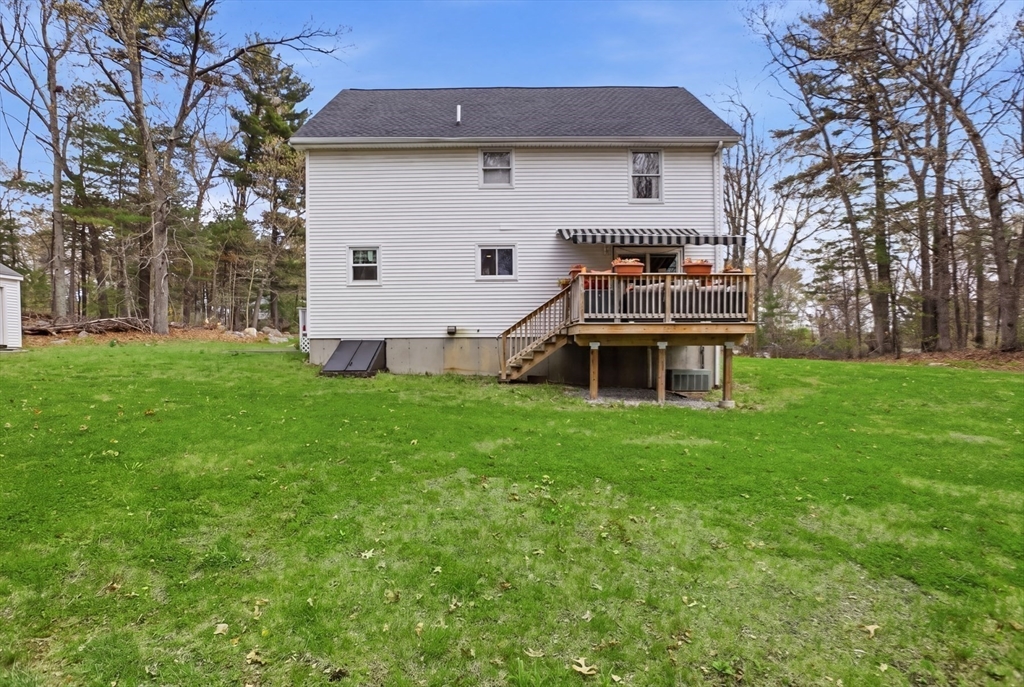 18 Trifiro Road Billerica, MA 01821 - Photo 37 of 42 a front view of a house with a yard and trees