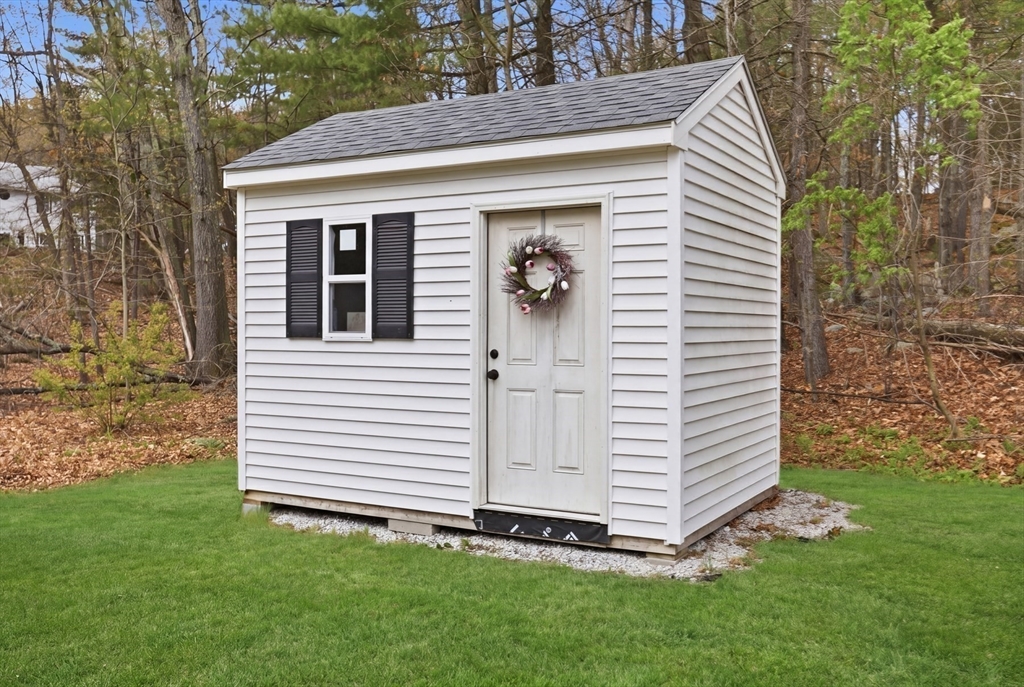 18 Trifiro Road Billerica, MA 01821 - Photo 40 of 42 a front view of a house with a yard