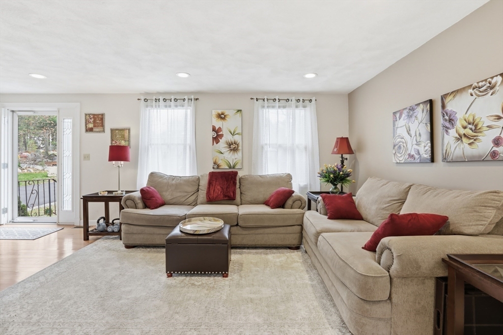 18 Trifiro Road Billerica, MA 01821 - Photo 7 of 42 a living room with furniture and a window