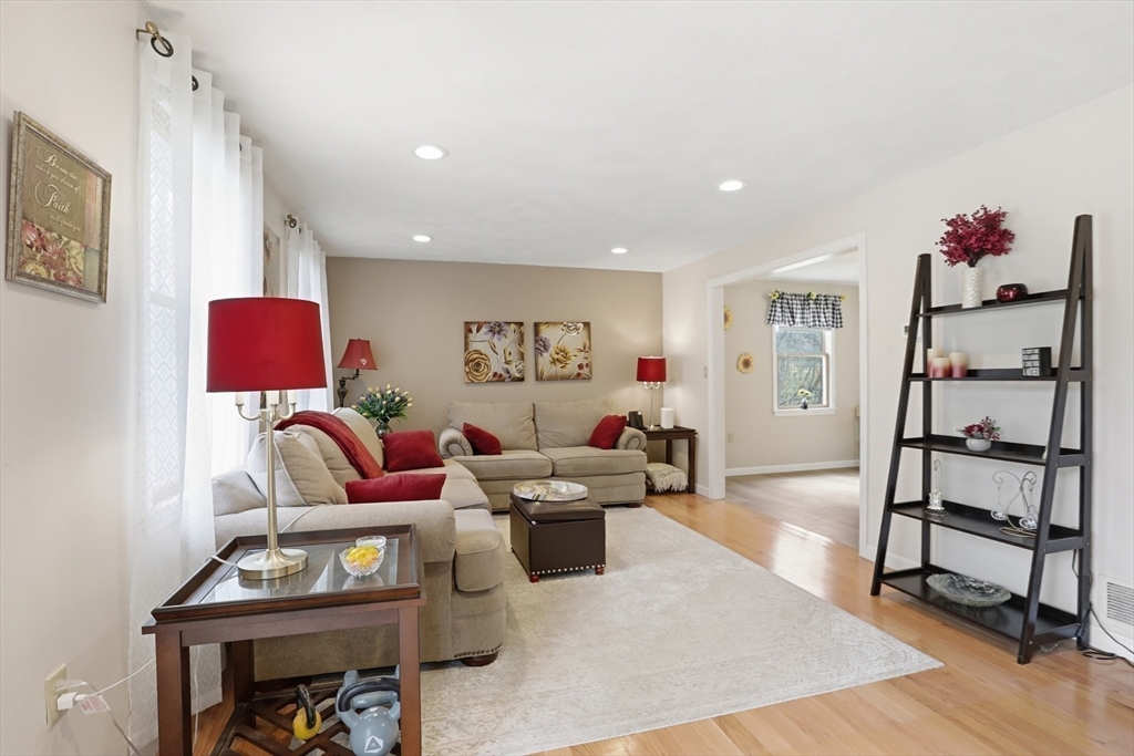 18 Trifiro Road Billerica, MA 01821 - Photo 8 of 42 a living room with furniture and a wooden floor