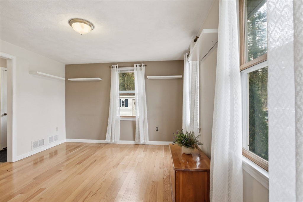 18 Trifiro Road Billerica, MA 01821 - Photo 10 of 42 an entryway at livingroom with furniture and wooden floor