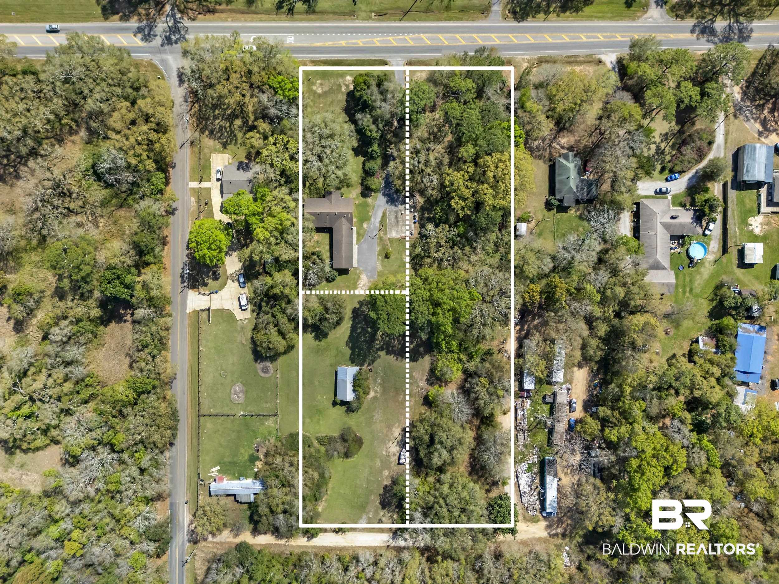 17463 Highway 98 Foley, AL 36535 - Photo 31 of 57 Aerial view of property's location with property parcel outlined and a tree filled landscape