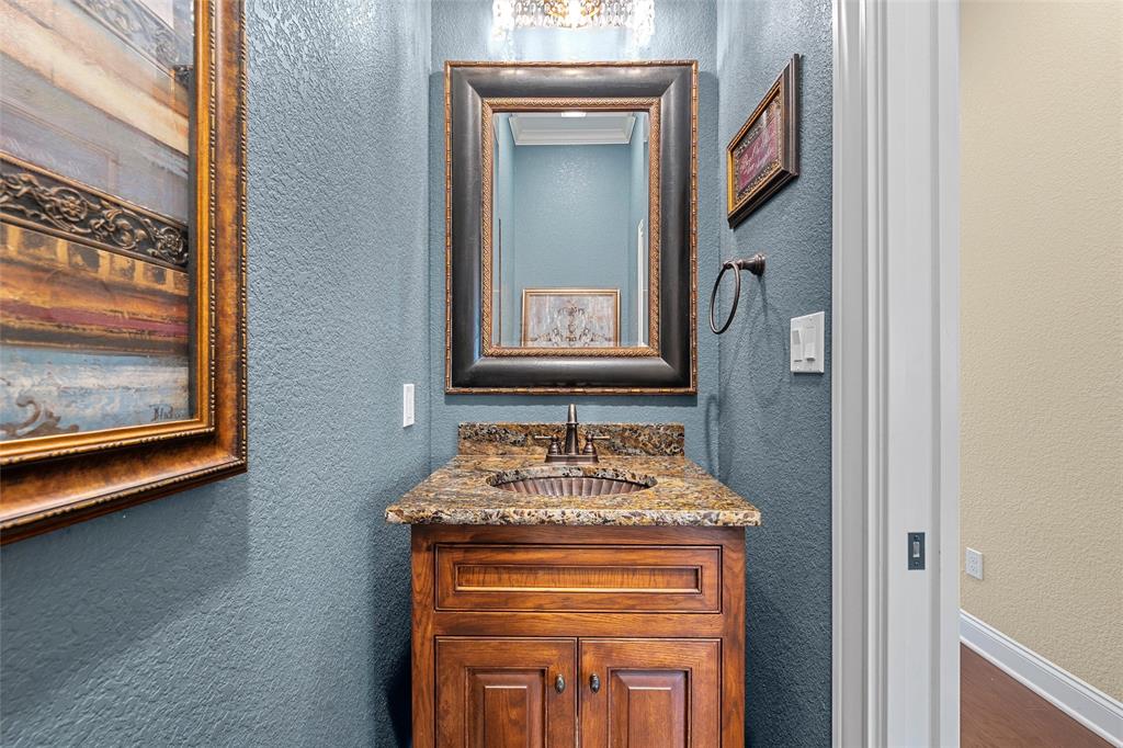 14690 Chapel Road Lorena, TX 76655 - Photo 15 of 40 a front view of a house with a front door and wooden floor