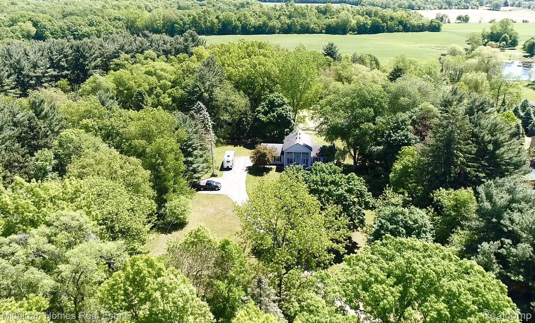 9198 Gould Road Linden, MI 48451 - Photo 7 of 56 WOW CAN YOU SEE THE WOODED GLORY OF THIS PROPERTY!?