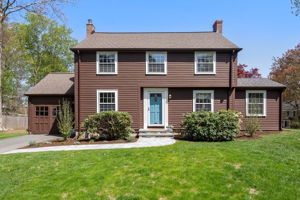 15 Lafayette Circle Wellesley, MA 02482 - Photo 1 of 23 a front view of a house with a yard