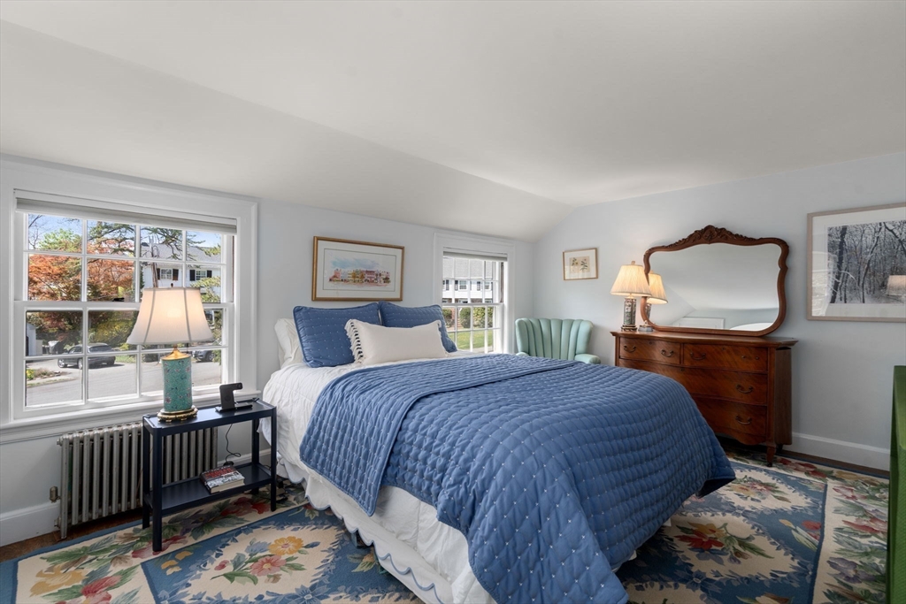 15 Lafayette Circle Wellesley, MA 02482 - Photo 21 of 23 a bedroom with a bed wooden floor and window