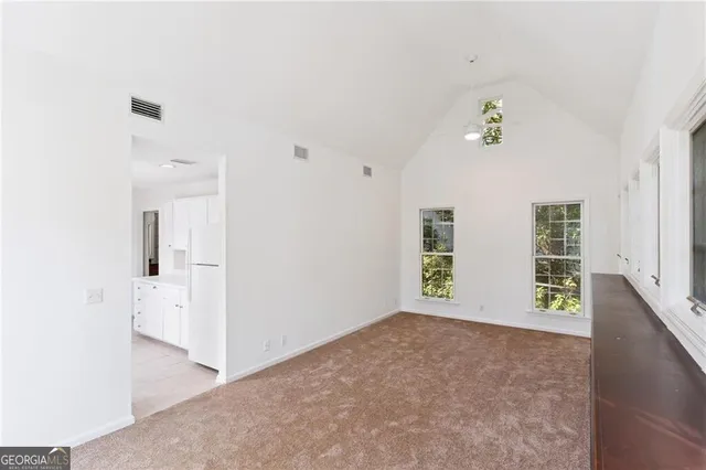 an empty room with windows