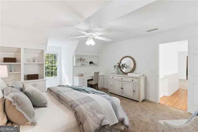 a bathroom with a sink double vanity and a mirror
