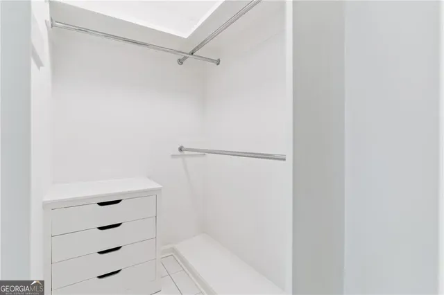 a balcony with furniture and wooden floor