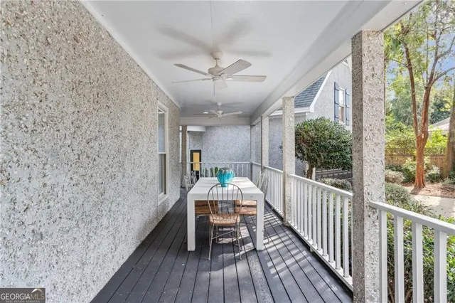 a front view of a house with a yard and a garage