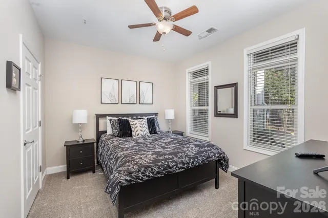 a view of a swimming pool and lounge chair