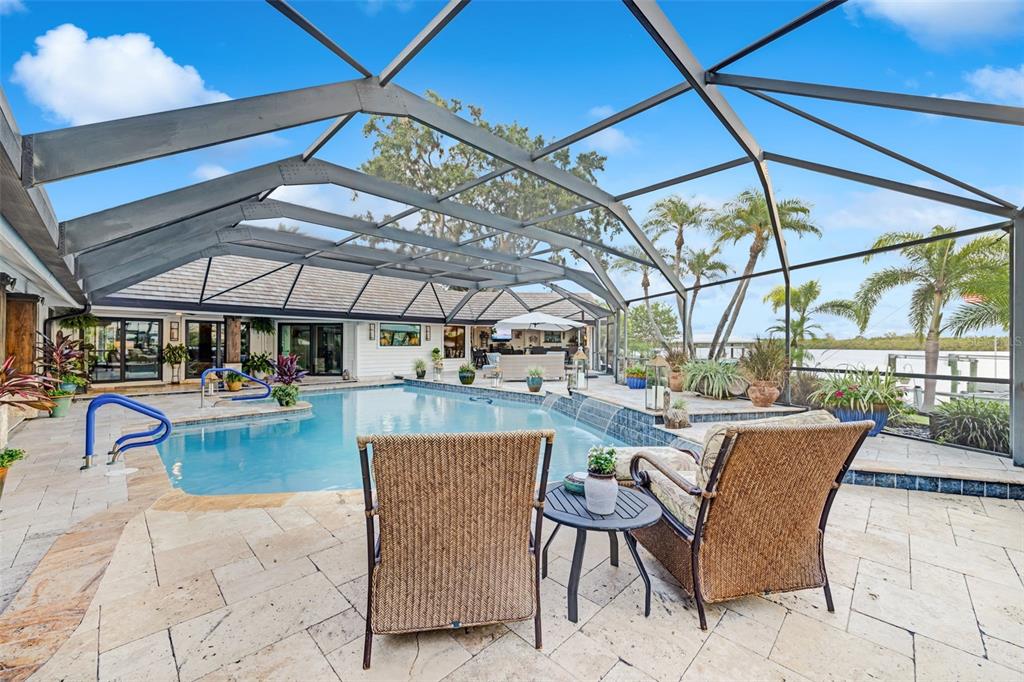 6605 Seabird Way Apollo Beach, FL 33572 - Photo 38 of 52 a view of a swimming pool with outdoor seating