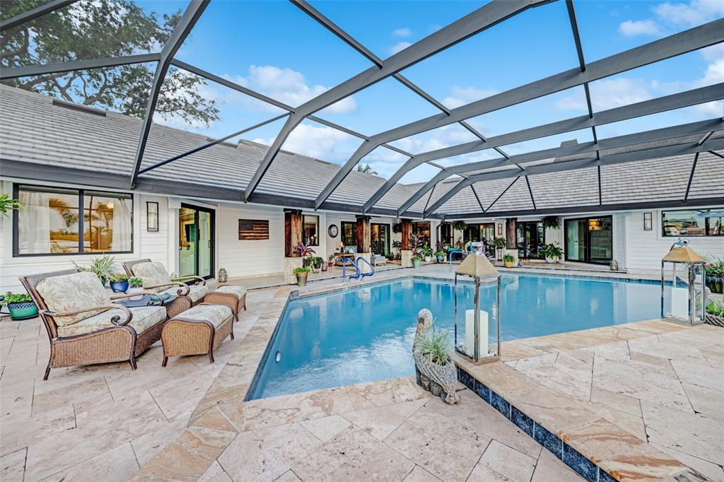 6605 Seabird Way Apollo Beach, FL 33572 - Photo 39 of 52 a view of a swimming pool with a patio