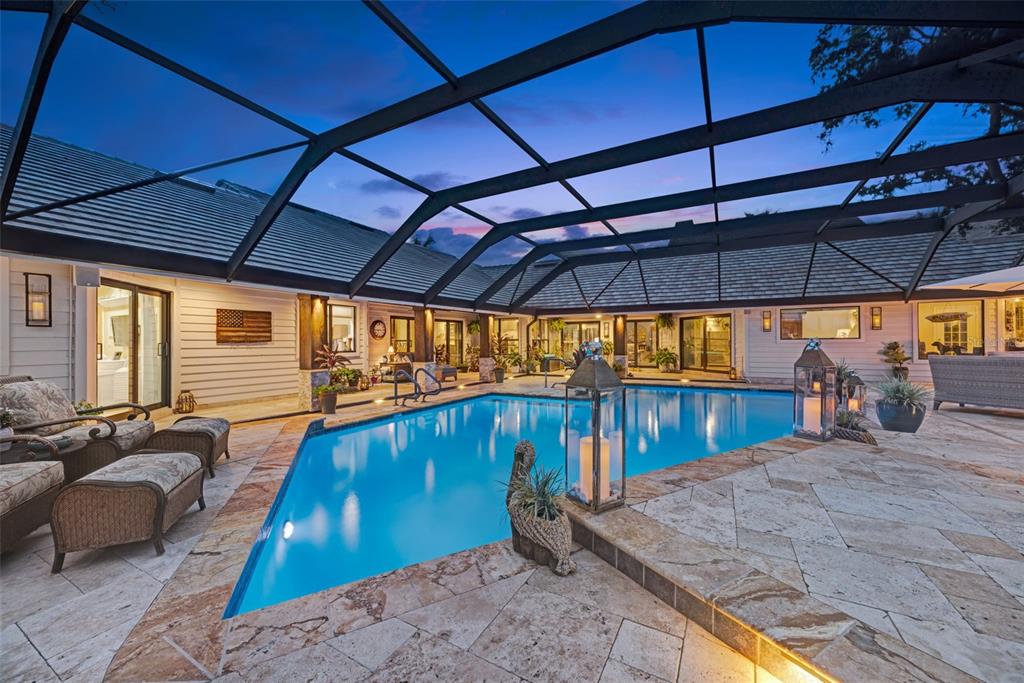 6605 Seabird Way Apollo Beach, FL 33572 - Photo 41 of 52 a view of a swimming pool with a patio