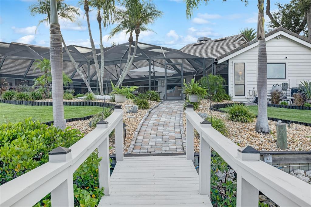 6605 Seabird Way Apollo Beach, FL 33572 - Photo 45 of 52 a front view of house with yard and green space