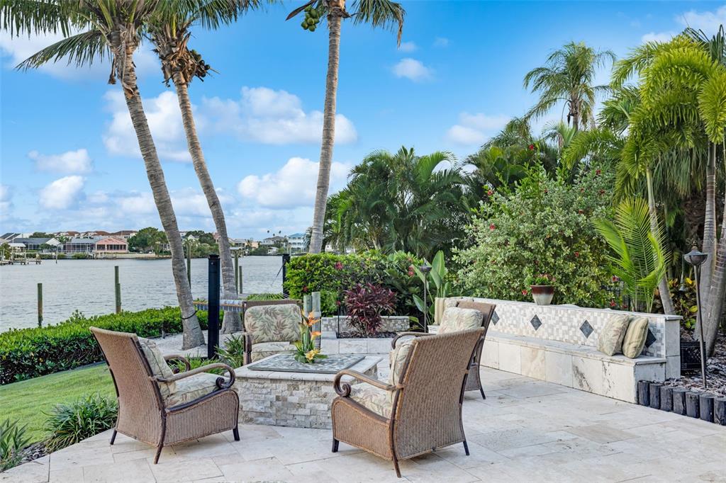 6605 Seabird Way Apollo Beach, FL 33572 - Photo 47 of 52 a view of a patio with a table and chairs