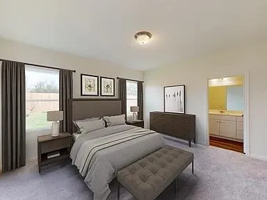 a view of a kitchen with wooden floor and a window
