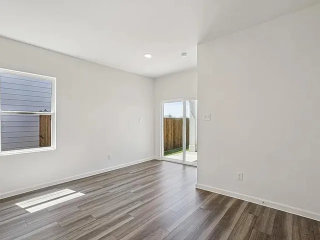 a kitchen with a sink stove and refrigerator