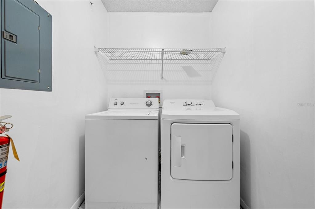 3921 Southwest 34th Street, Unit 208 Gainesville, FL 32608 - Photo 31 of 33 a utility room with dryer and washer