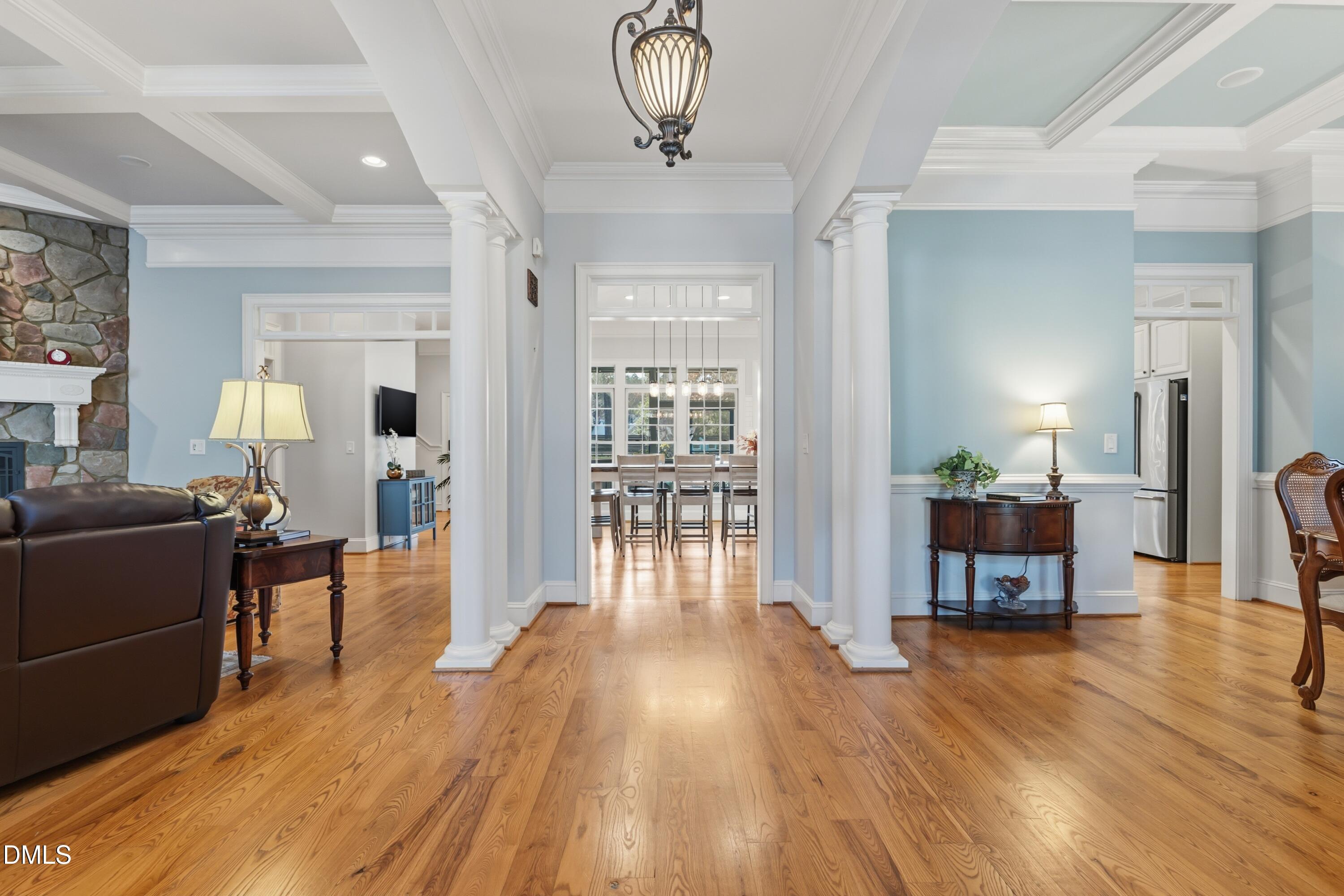 1709 Colombard Court Wake Forest, NC 27587 - Photo 10 of 49 a living room with furniture and a wooden floor