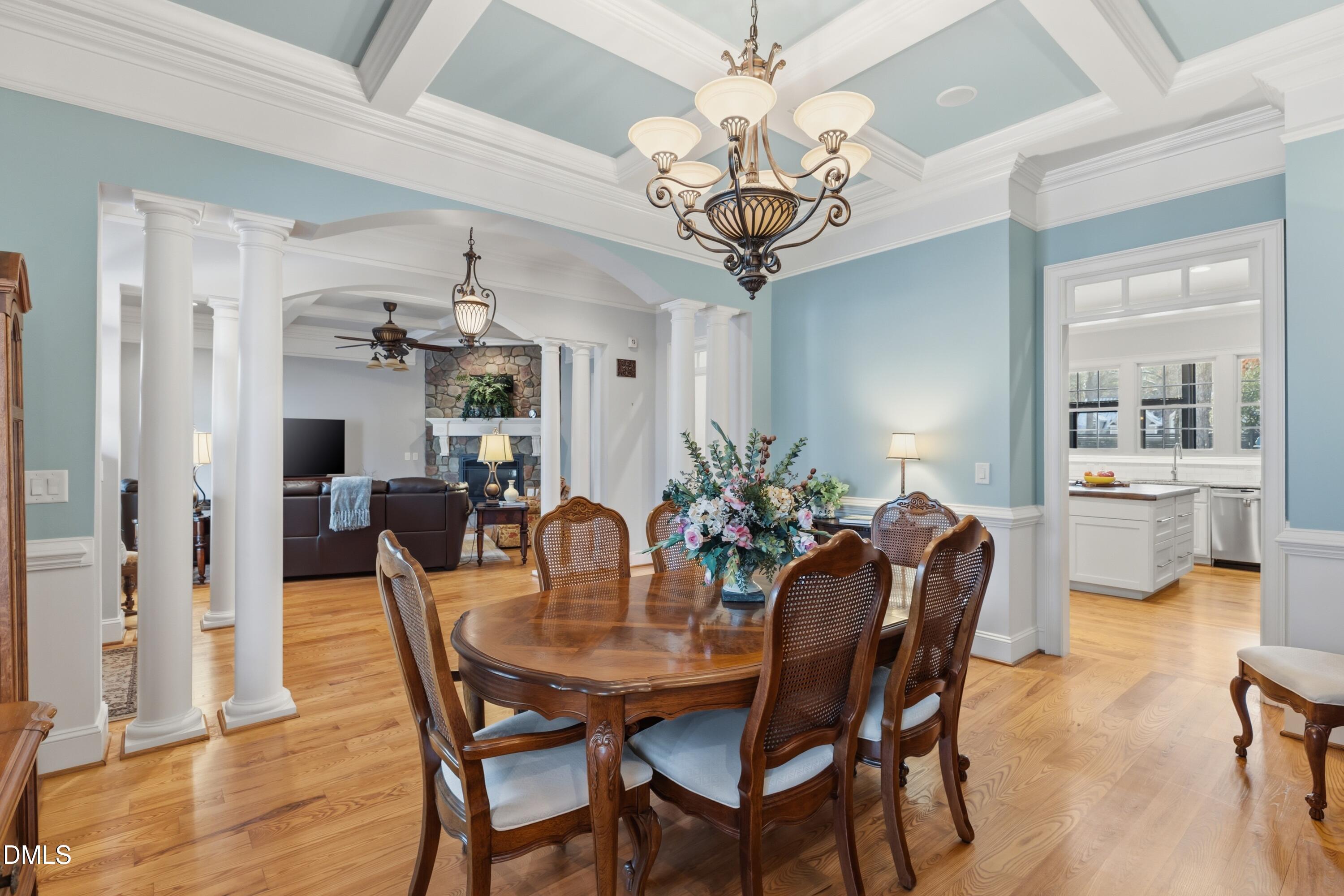 1709 Colombard Court Wake Forest, NC 27587 - Photo 12 of 49 a view of a dining room with furniture wooden floor and chandelier