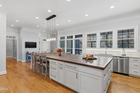 a kitchen with a sink and counter top space