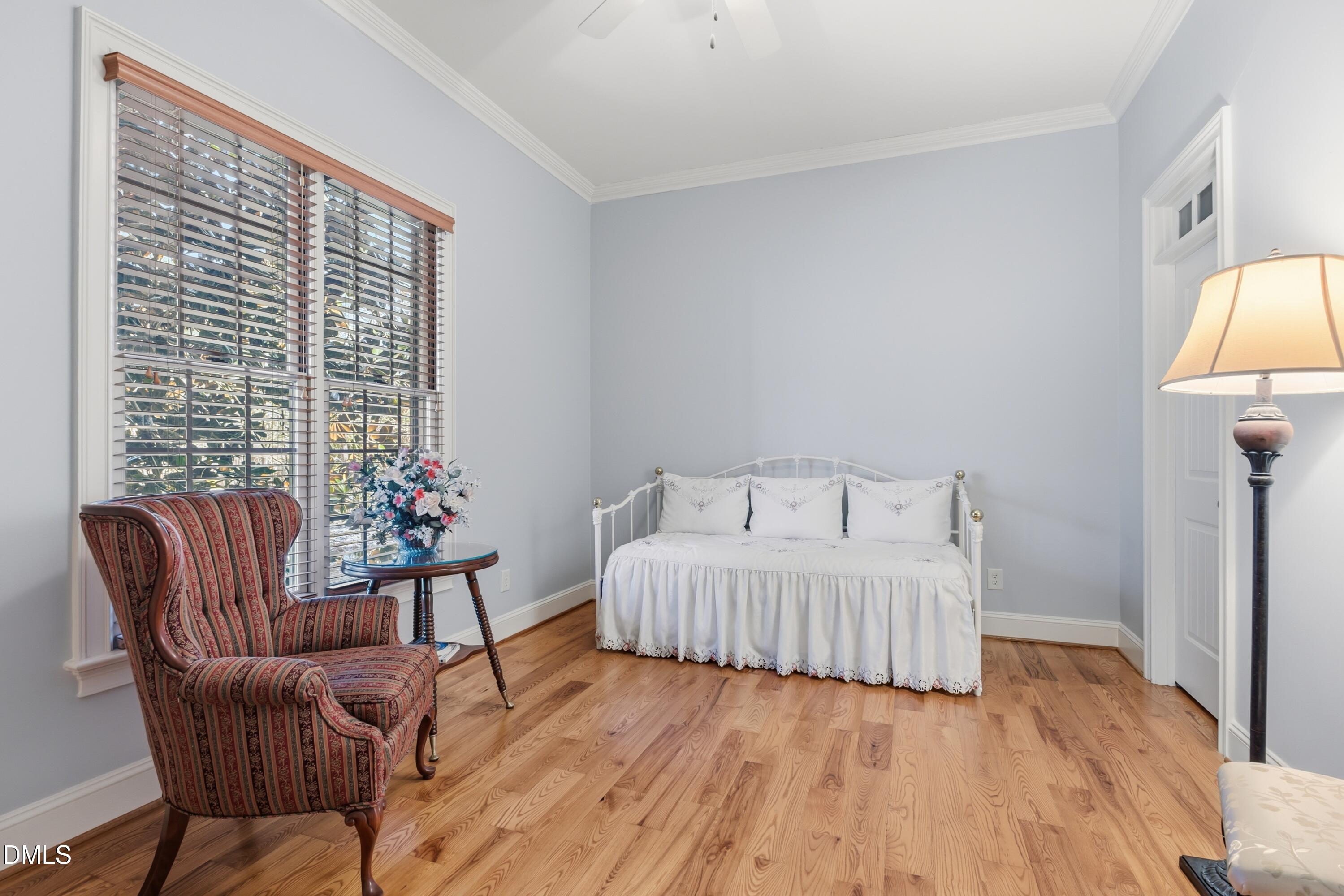 1709 Colombard Court Wake Forest, NC 27587 - Photo 21 of 49 a bedroom with a bed and a window
