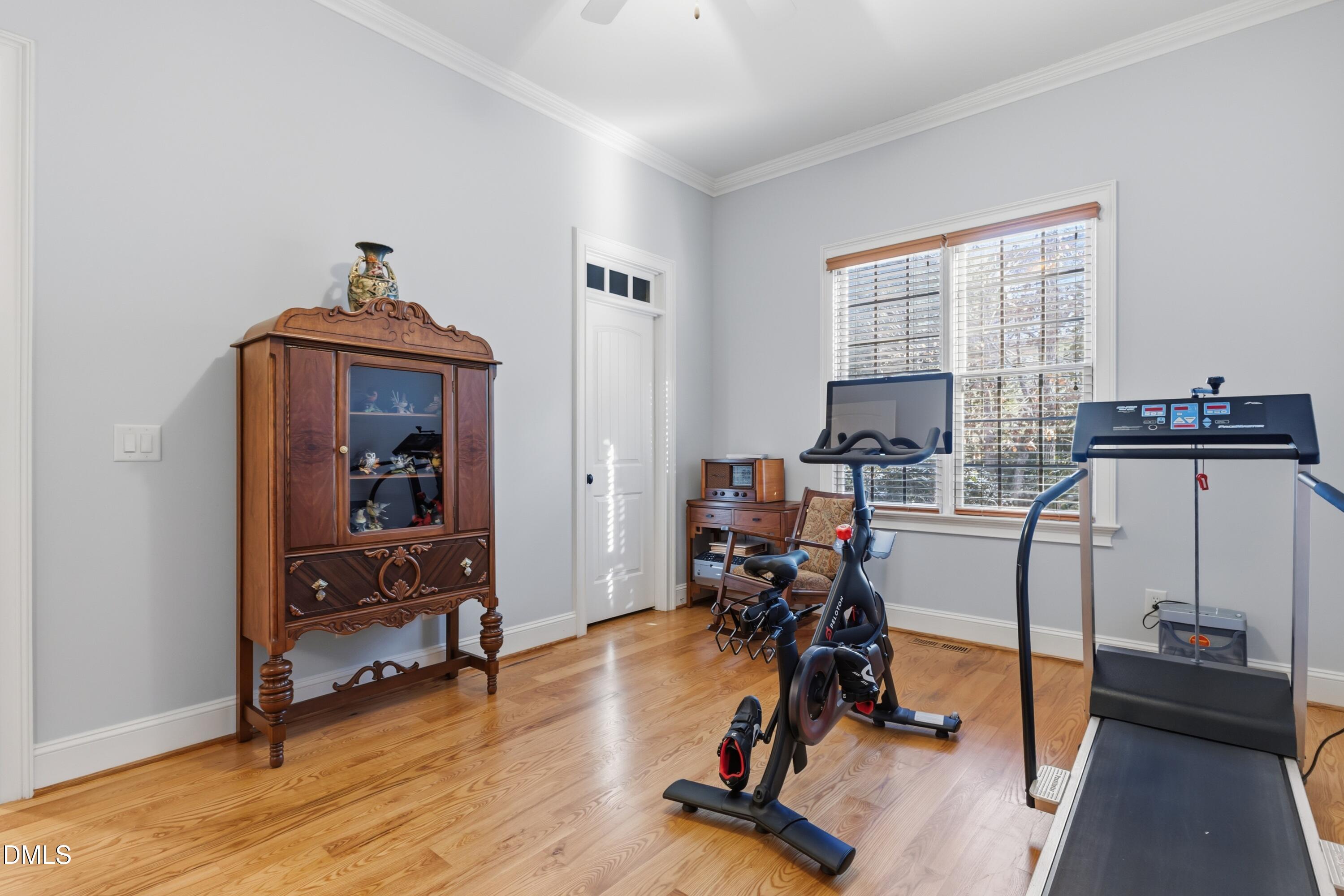 1709 Colombard Court Wake Forest, NC 27587 - Photo 24 of 49 a view of a workspace with furniture and a window