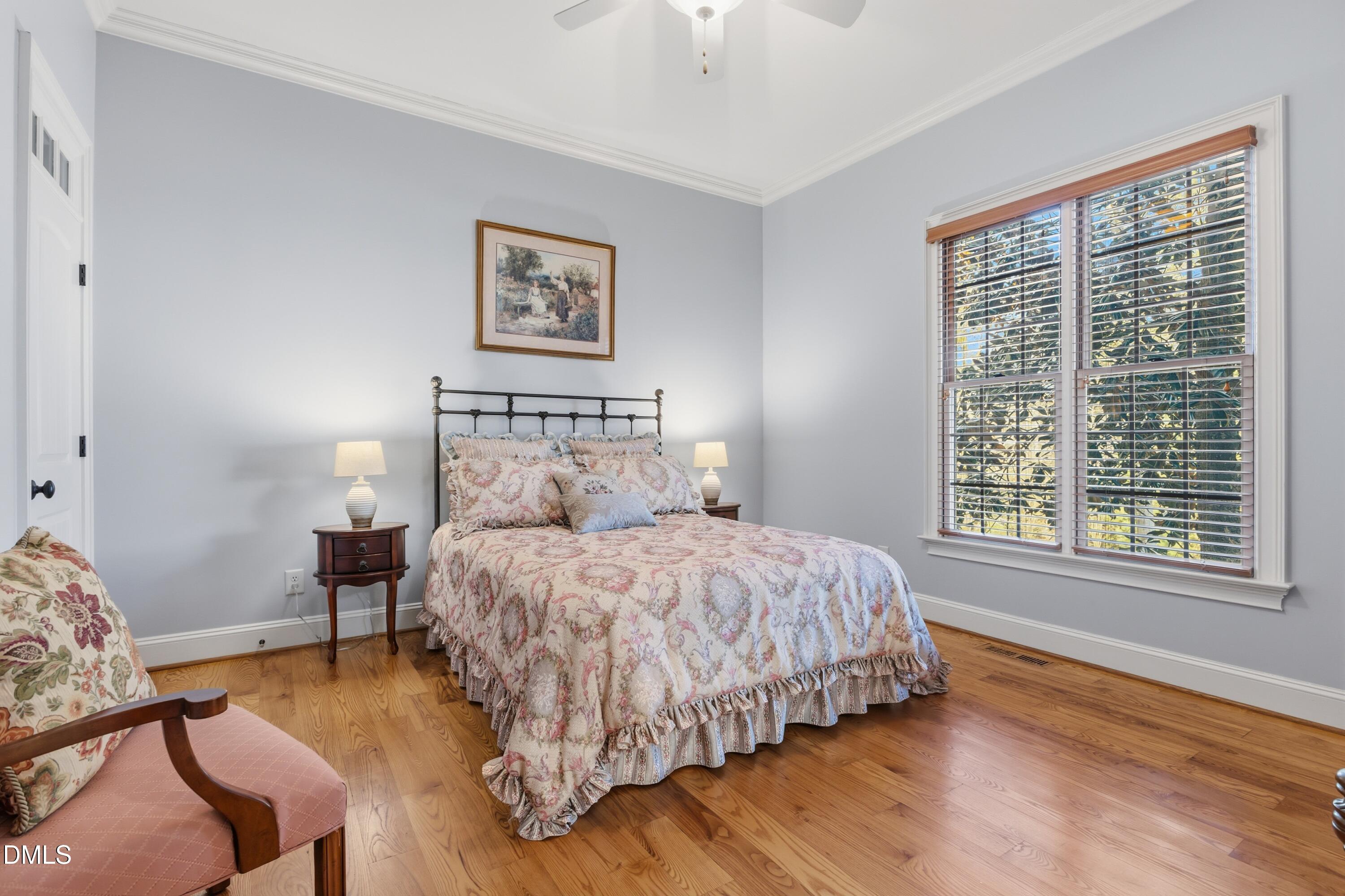 1709 Colombard Court Wake Forest, NC 27587 - Photo 25 of 49 a bedroom with bed and a window