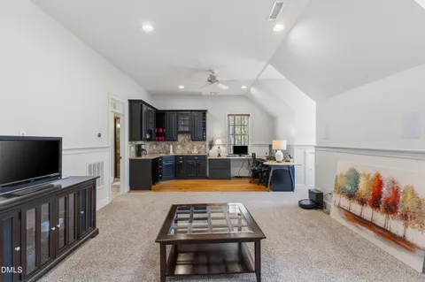 a view of a living room and a flat screen tv