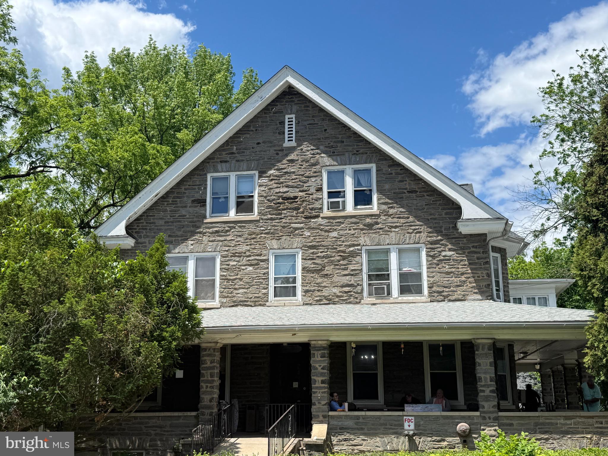 31 West Mill Road Flourtown, PA 19031 - Photo 1 of 12 a front view of a house with porch