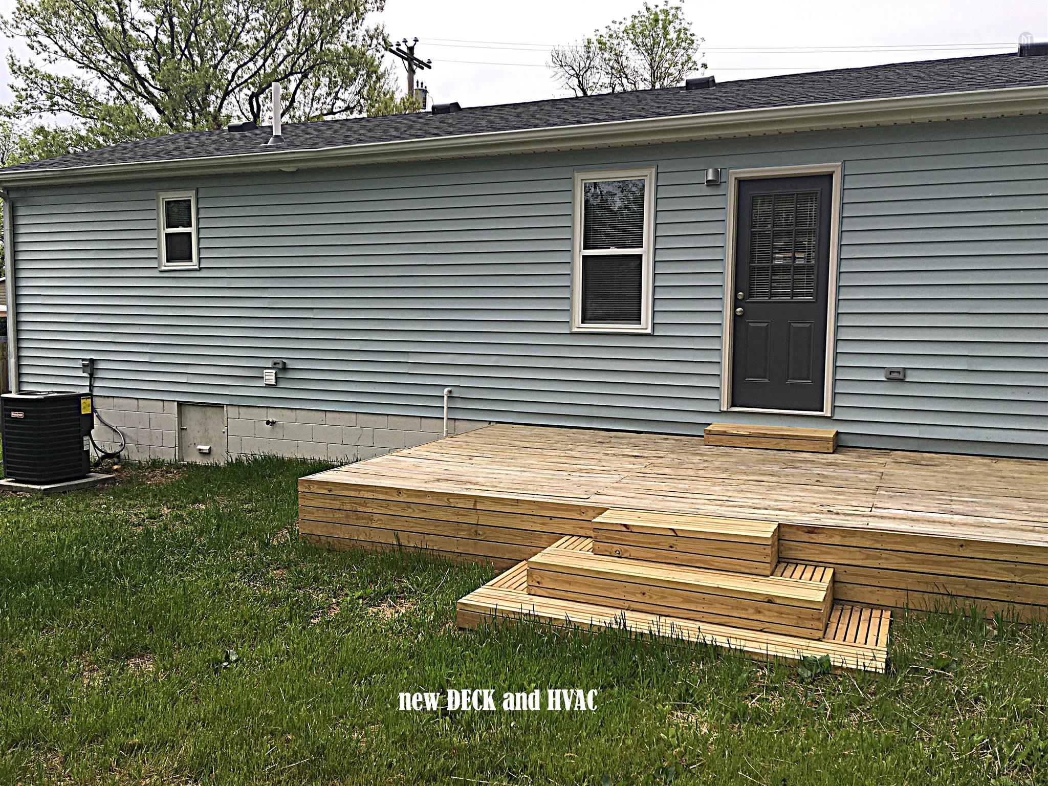 213 Warrior Road Madison, TN 37115 - Photo 11 of 11 Back deck. Not shown: large concrete patio area, plus side patio. Rear yard is fenced in chain link with privacy panels facing street.