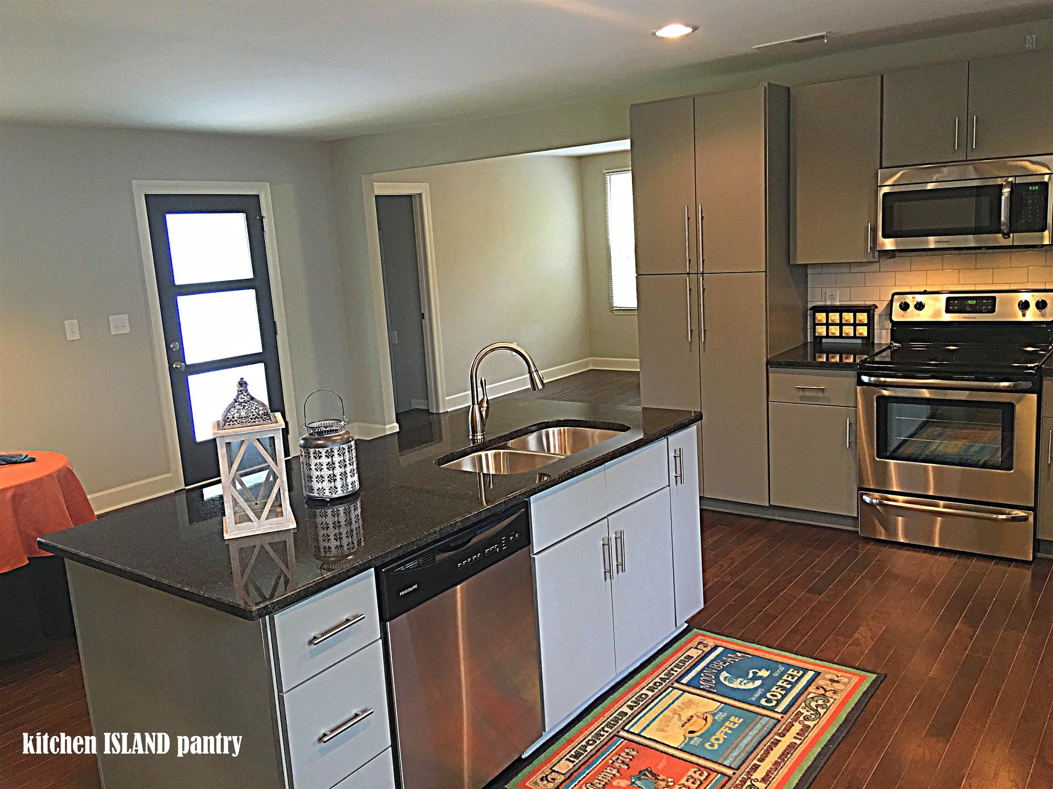 213 Warrior Road Madison, TN 37115 - Photo 5 of 11 Love the chunky cabinet pulls, new appliances, hardwoods, open plan. New front door with glass panels.
