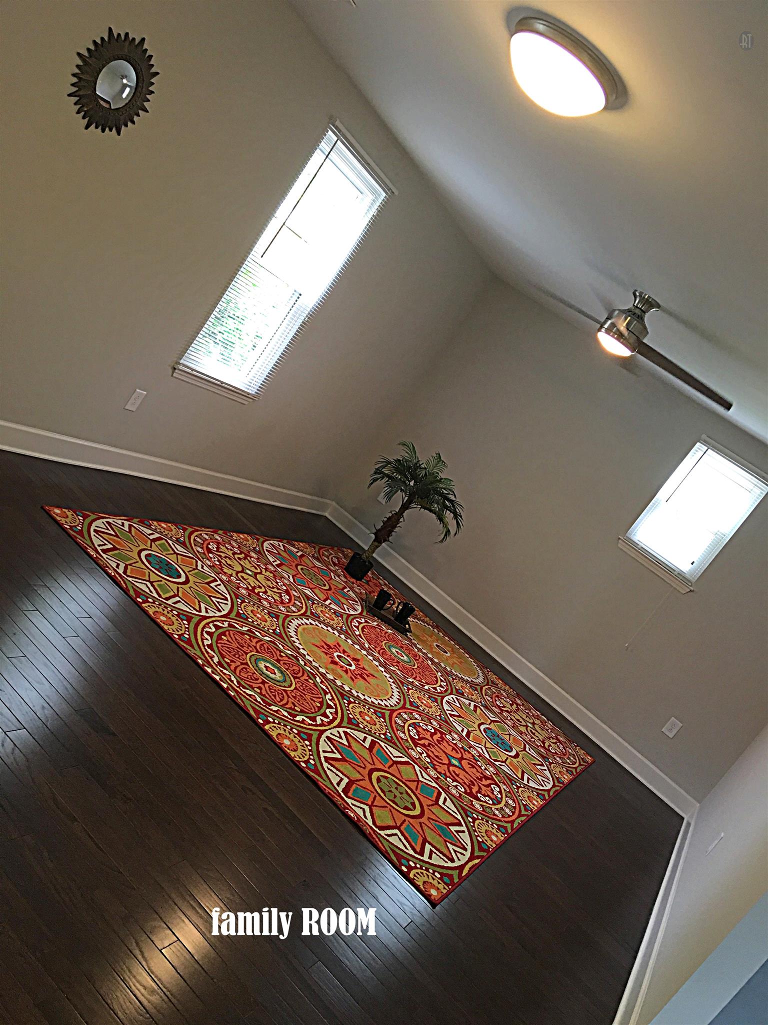 213 Warrior Road Madison, TN 37115 - Photo 6 of 11 Large living room with ceiling fan. Hardwoods. GOOD TO KNOW: Windows have new blinds for move-in privacy.