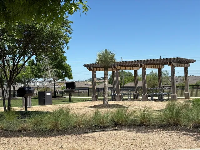 a view of a park with tree s