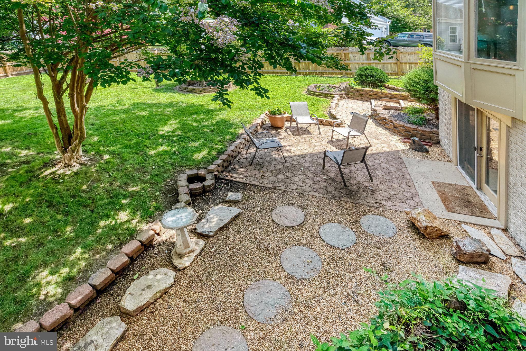 21 Burns Road Stafford, VA 22554 - Photo 24 of 35 Serene backyard oasis with stone pathways.
