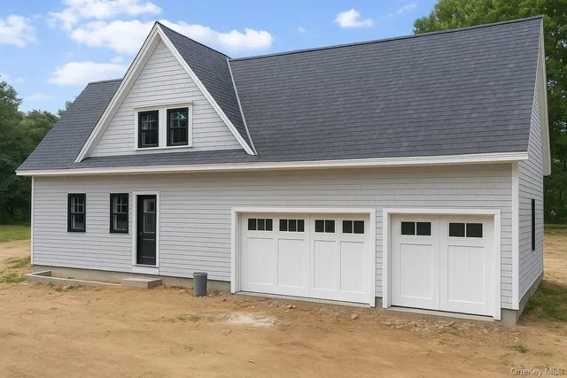 a view of a house with a garage