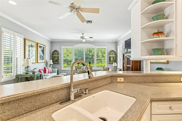 a large white room with a large window and walk in closet