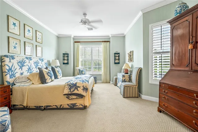 a view of a livingroom with furniture and a large window