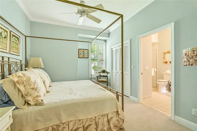 a bedroom with a bed and a shower